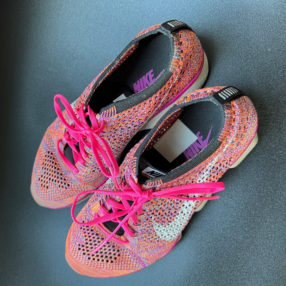 Nike Pink Athletic Shoes with Sparkly Design